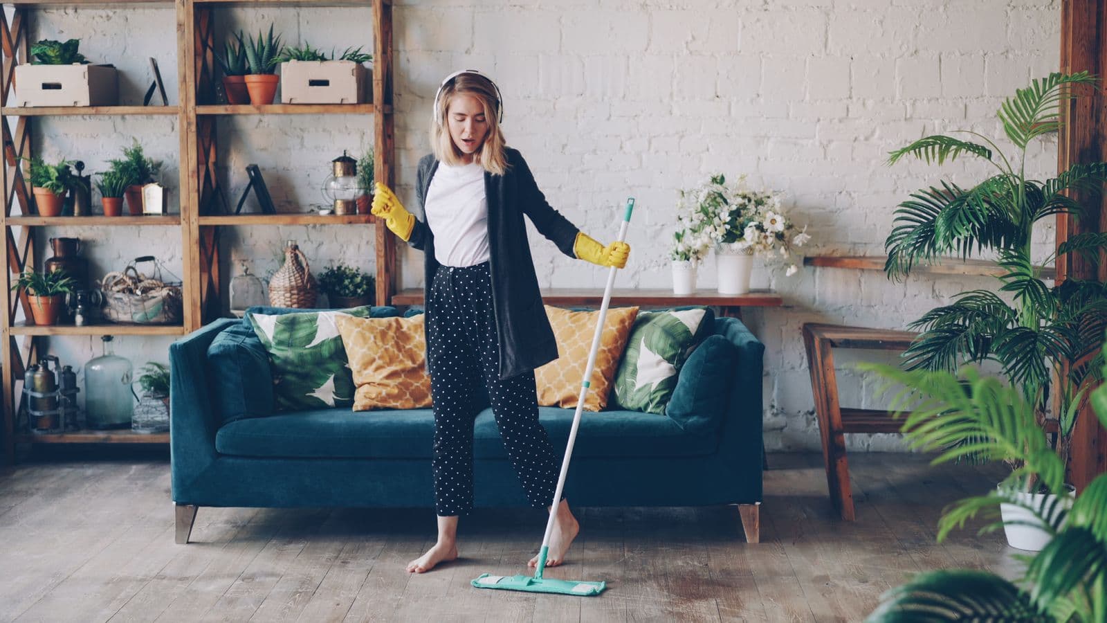 Spring cleaning supplies and organized boxes in a bright Southern California home
